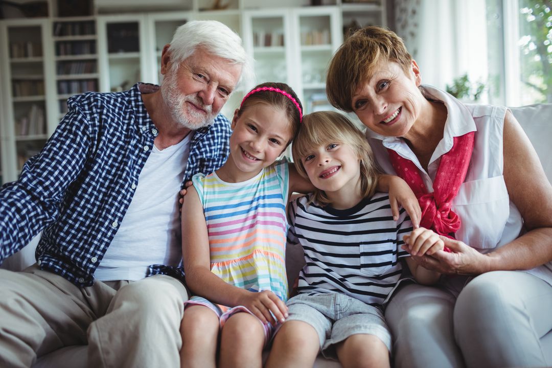 Three generations of a family sharing stories together at home